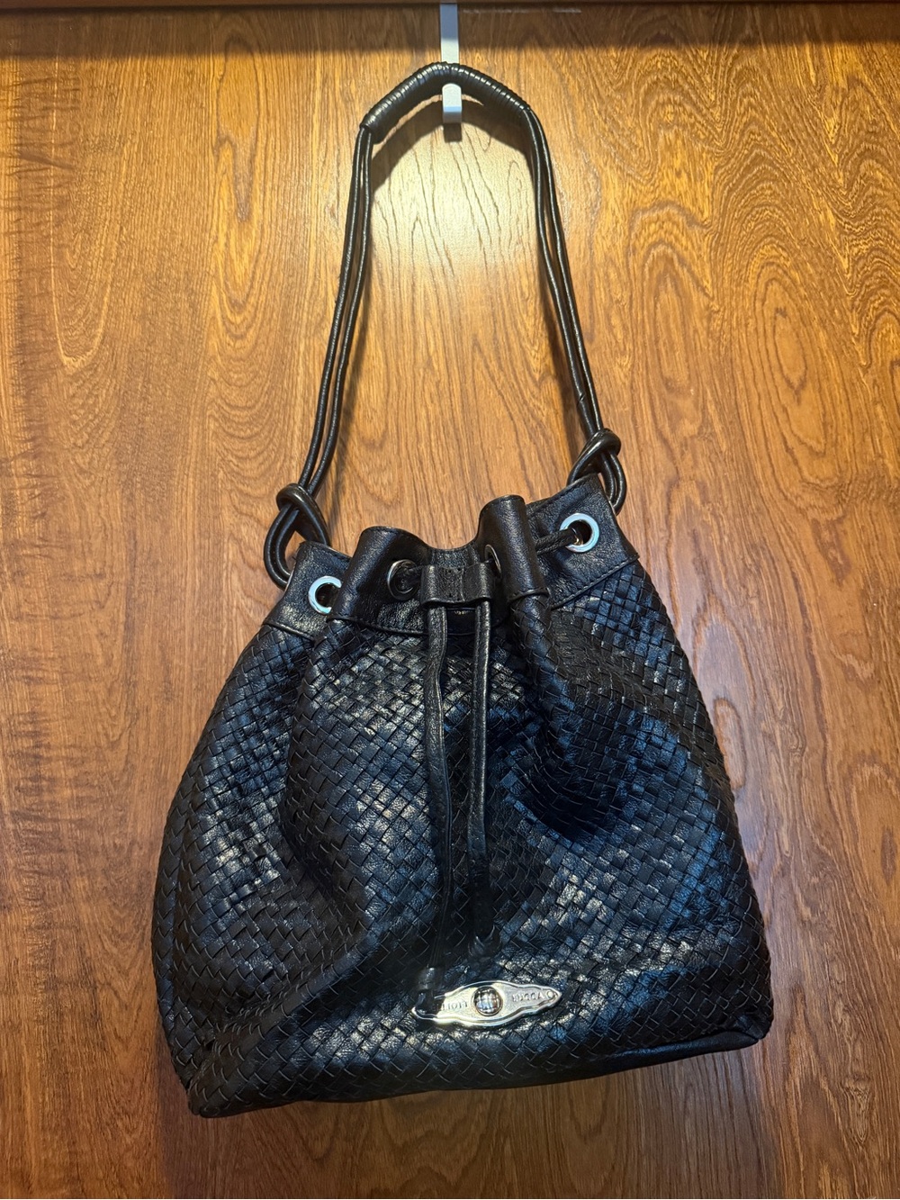Black Woven Leather Drawstring Shoulder Bag with Silver Plaque